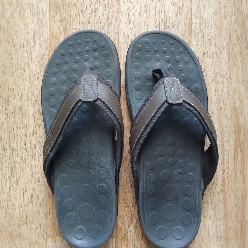 Brown male flip flop.